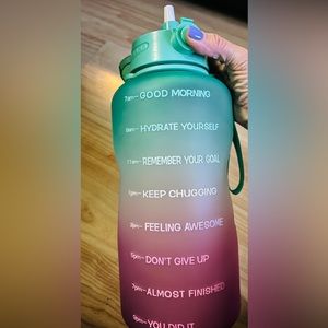 Water Bottle with straw and handle.